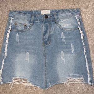 Vestique light wash distressed denim skirt